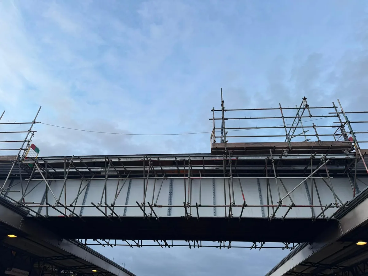 Rolling scaffold unit on the roof of the station footbridge at Worcester Shrub Hill